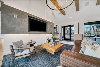 A living room with couches and a tv